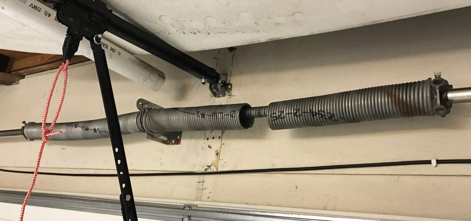 Garage torsion spring repair Monroe County NY Broken Torsion garage spring Monroe County NY